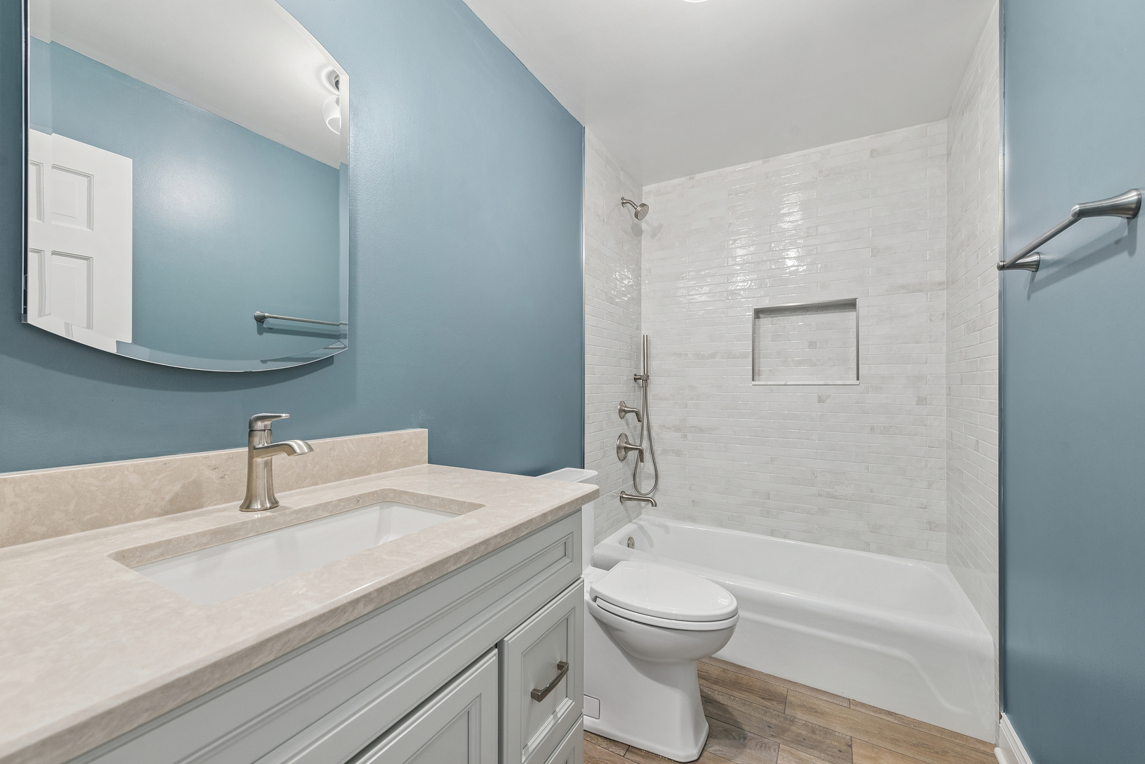 1500 Sheridan Road, Unit 1K Wilmette, IL 60091 - Photo 18 of 25 a bathroom with a sink a toilet and shower