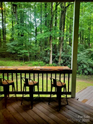 a view of a two chairs in the deck