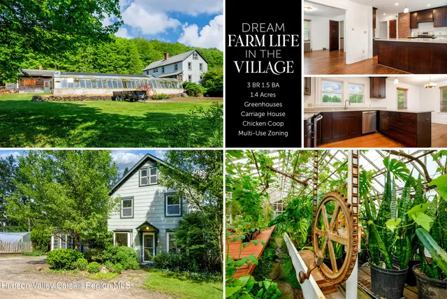 a front view of a house with a yard and potted plants