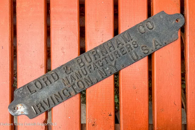 a view of swimming pool with a potted plants