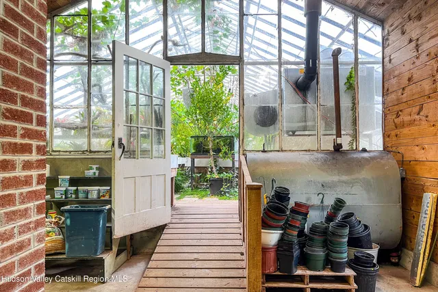 a kitchen with a sink cabinets and window