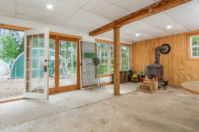 a view of balcony with wooden floor and fence