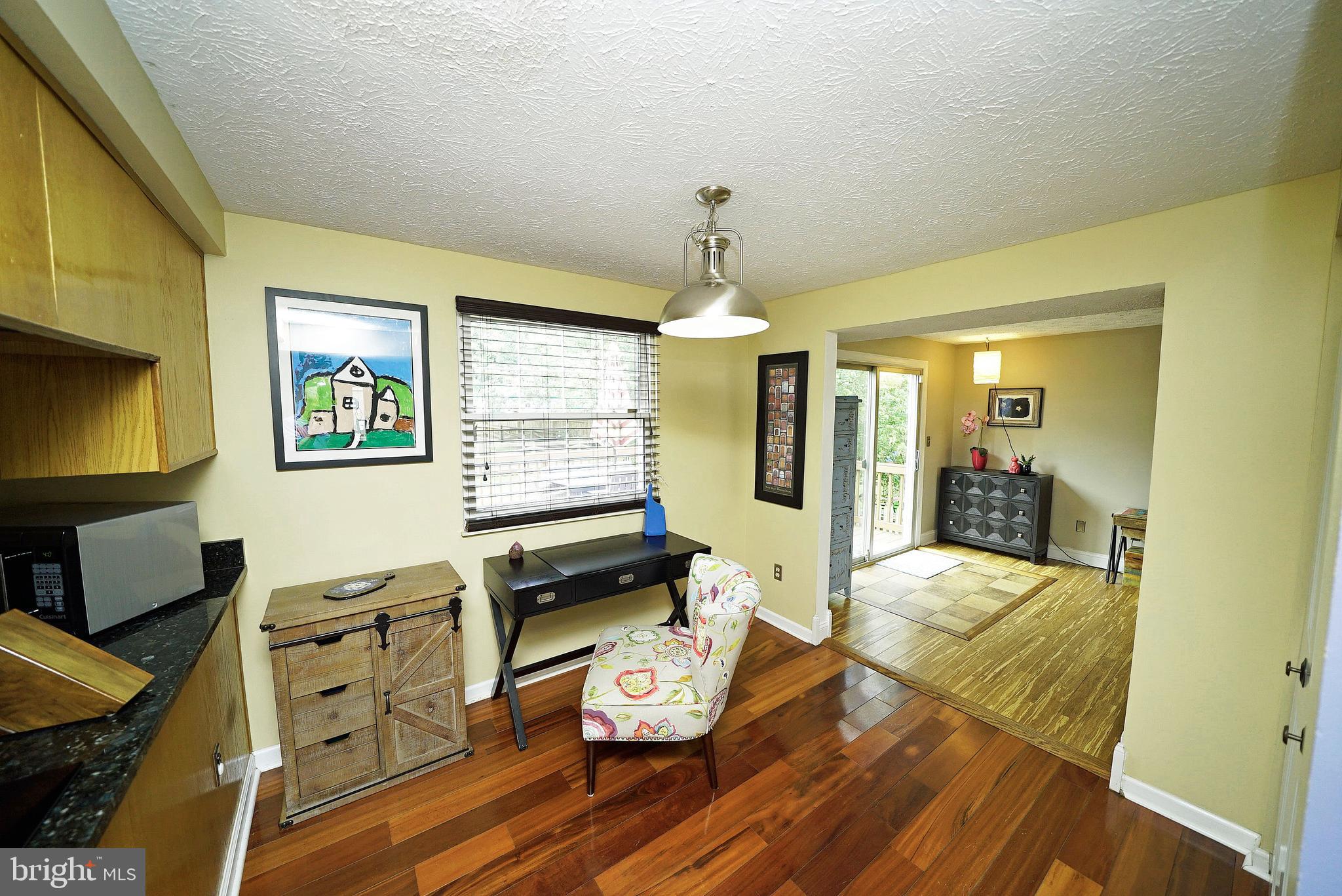 4424 Cub Run Road Chantilly, VA 20151 - Photo 15 of 30 a living room with furniture and a flat screen tv