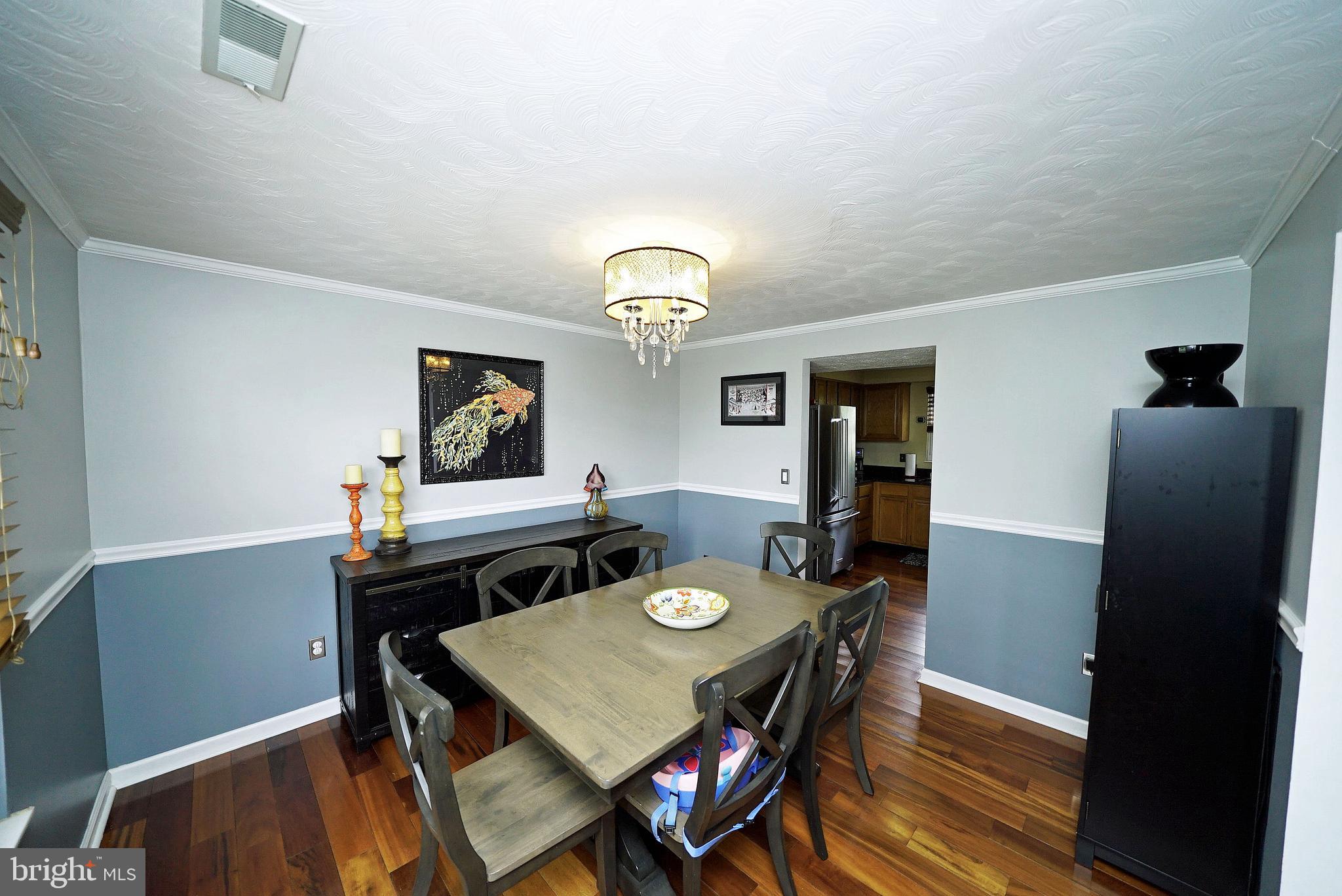 4424 Cub Run Road Chantilly, VA 20151 - Photo 16 of 30 a view of a dining room with furniture and window
