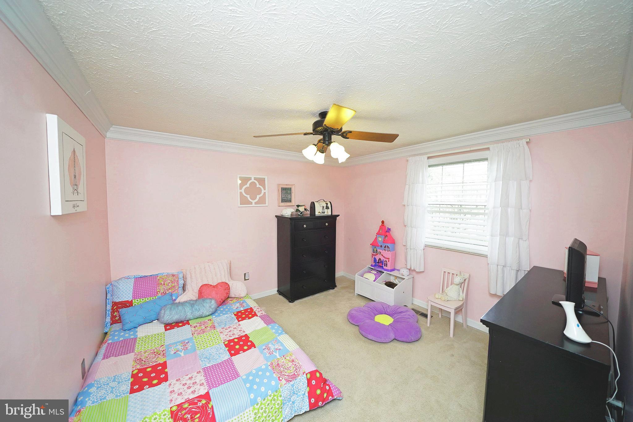4424 Cub Run Road Chantilly, VA 20151 - Photo 26 of 30 a bedroom with a bed dresser and a window