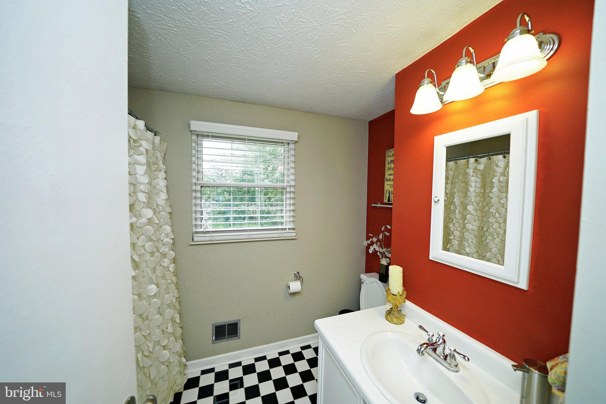 4424 Cub Run Road Chantilly, VA 20151 - Photo 29 of 30 a bathroom with a sink and a window