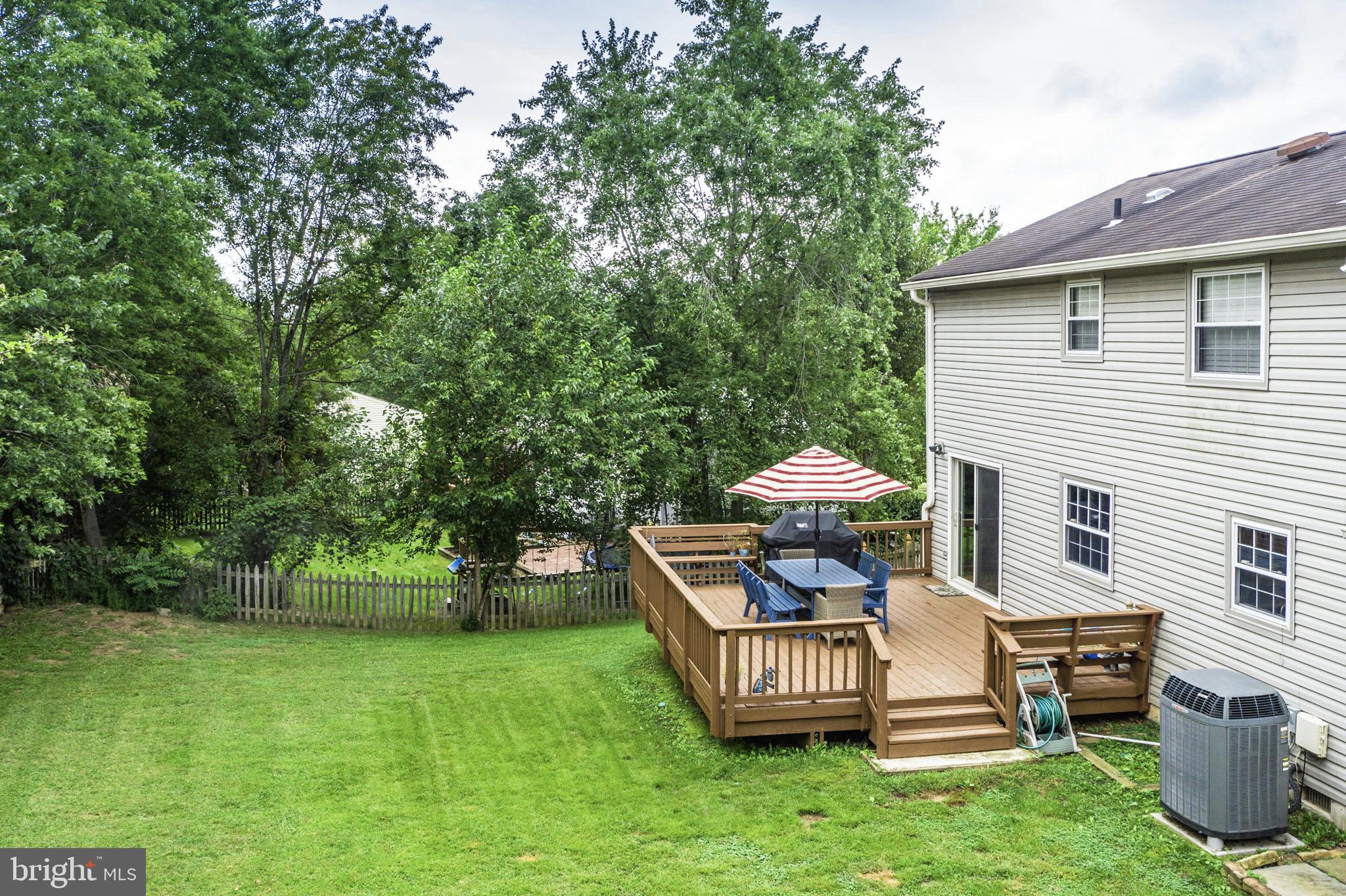 4424 Cub Run Road Chantilly, VA 20151 - Photo 5 of 30 a table and chairs in the garden
