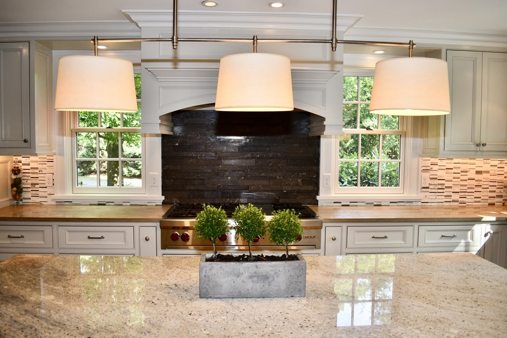 49 Fiske Road Wellesley, MA 02481 - Photo 8 of 29 a kitchen with a large window and a table