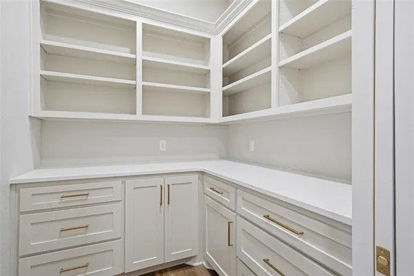 a view of an empty walk in closet