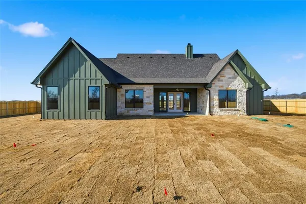 a house view with a garden space