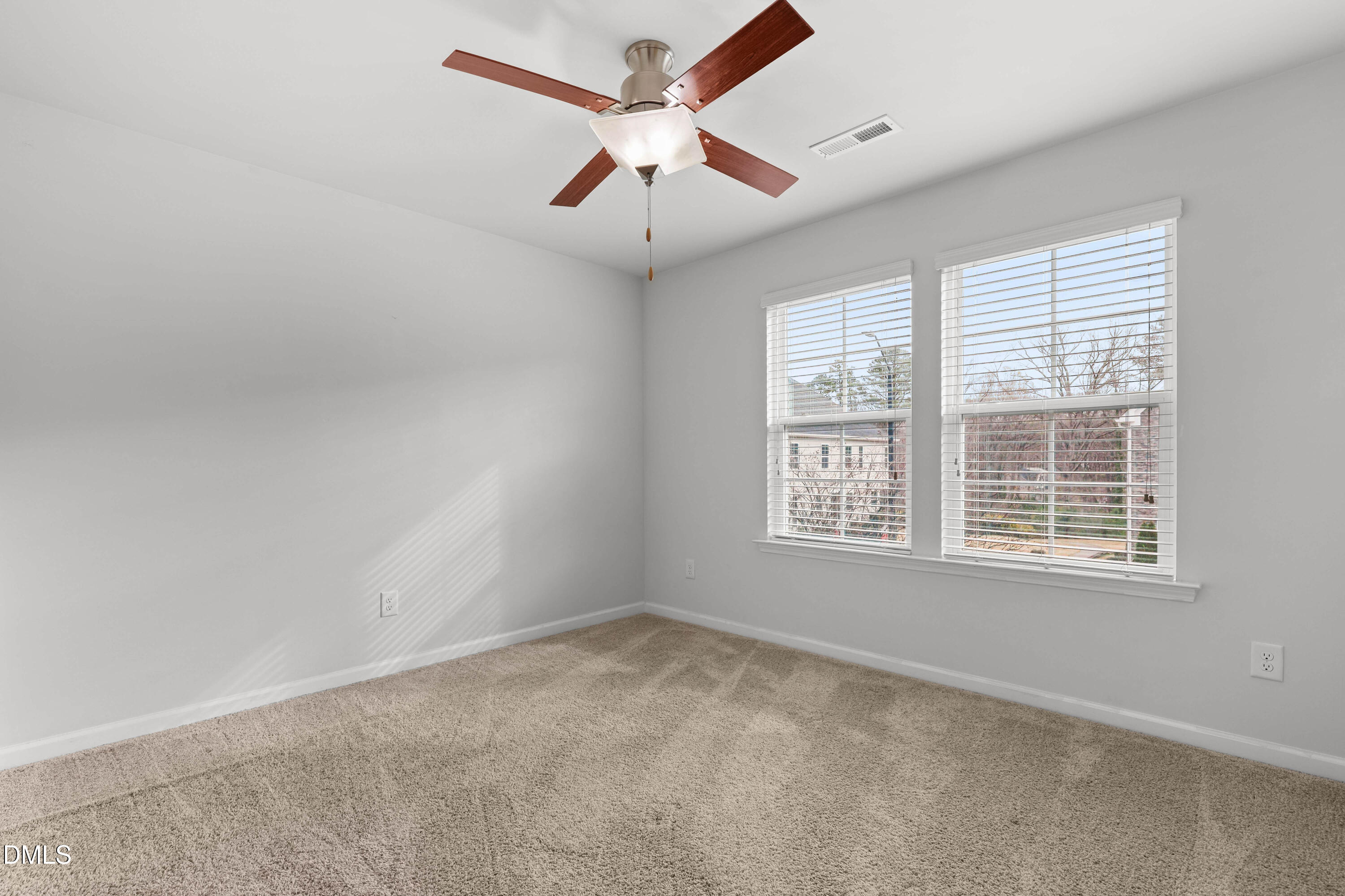 1109 Laurel Twist Road Cary, NC 27513 - Photo 29 of 37 a view of an empty room with a window
