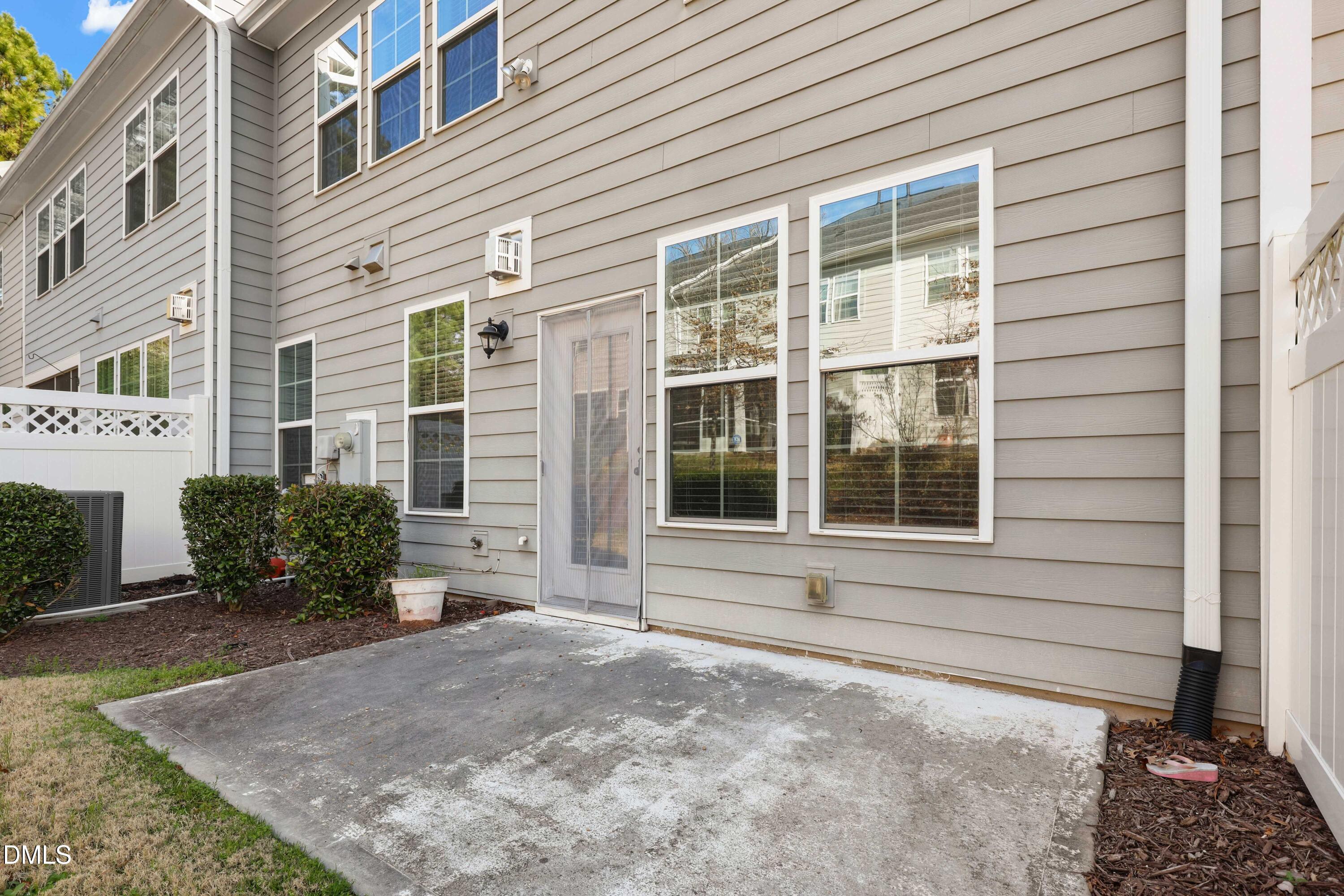 1109 Laurel Twist Road Cary, NC 27513 - Photo 36 of 37 a front view of a house with a yard