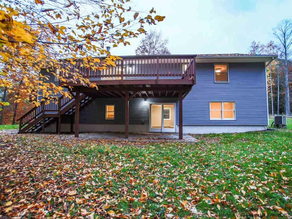 589 Decker Road Wallkill, NY 12589 - Photo 5 of 26 a front view of a house with glass windows