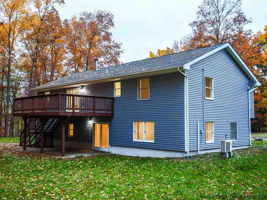 589 Decker Road Wallkill, NY 12589 - Photo 6 of 26 a front view of a house with a yard