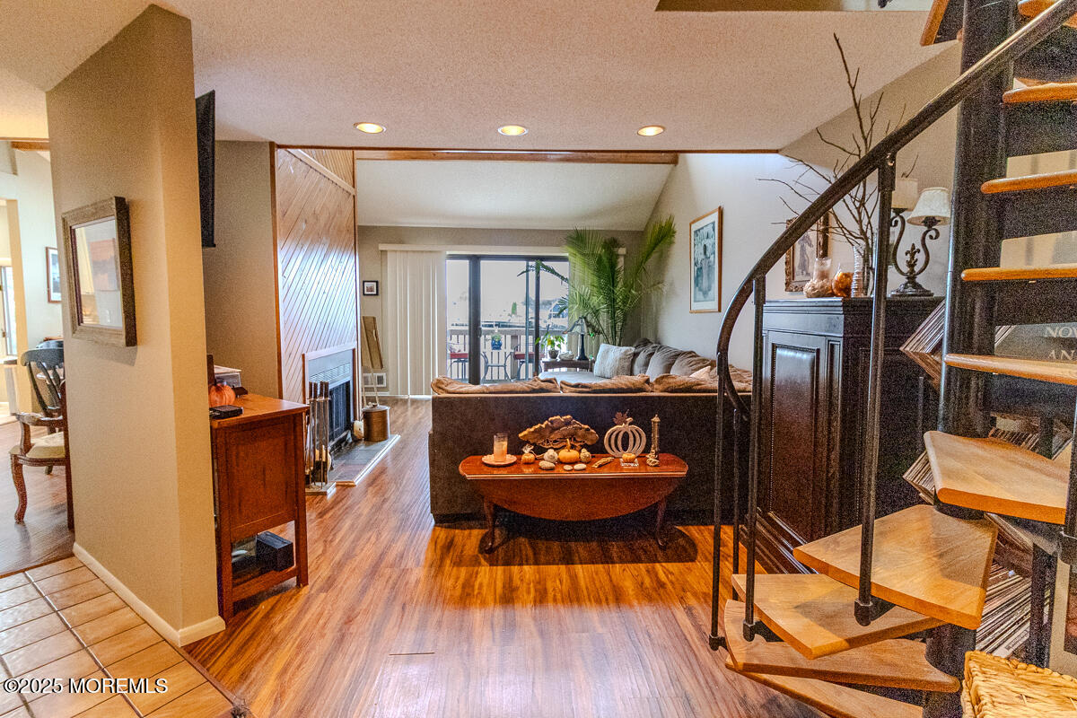 8 Hidden Harbor Drive Point Pleasant, NJ 08742 - Photo 5 of 32 a living room with furniture and a wooden floor