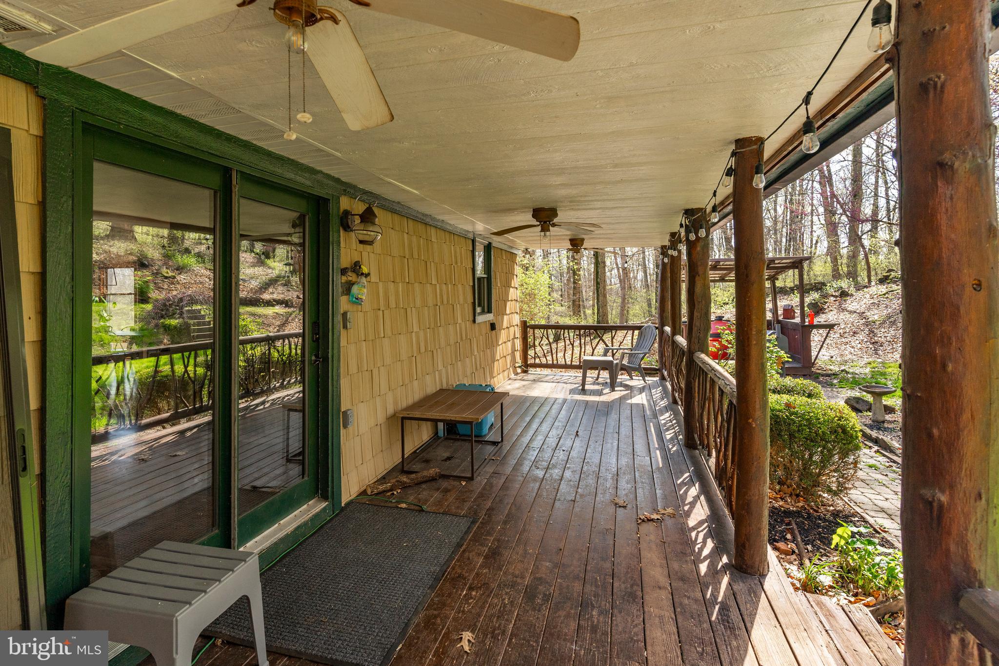 755 Sportsman Road Denver, PA 17517 - Photo 18 of 77 a view of a porch with wooden floor
