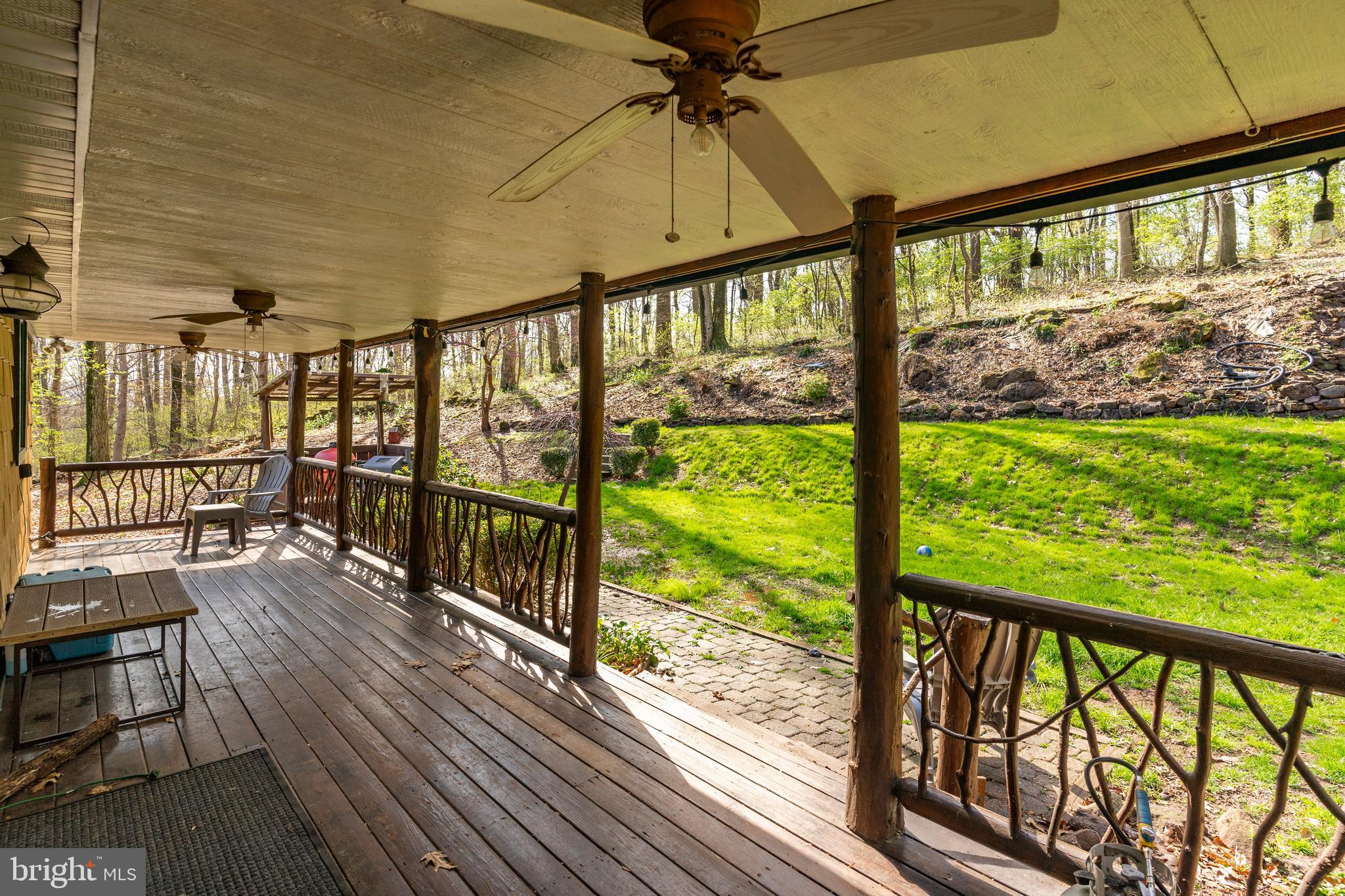 755 Sportsman Road Denver, PA 17517 - Photo 19 of 77 a view of a balcony with wooden floor