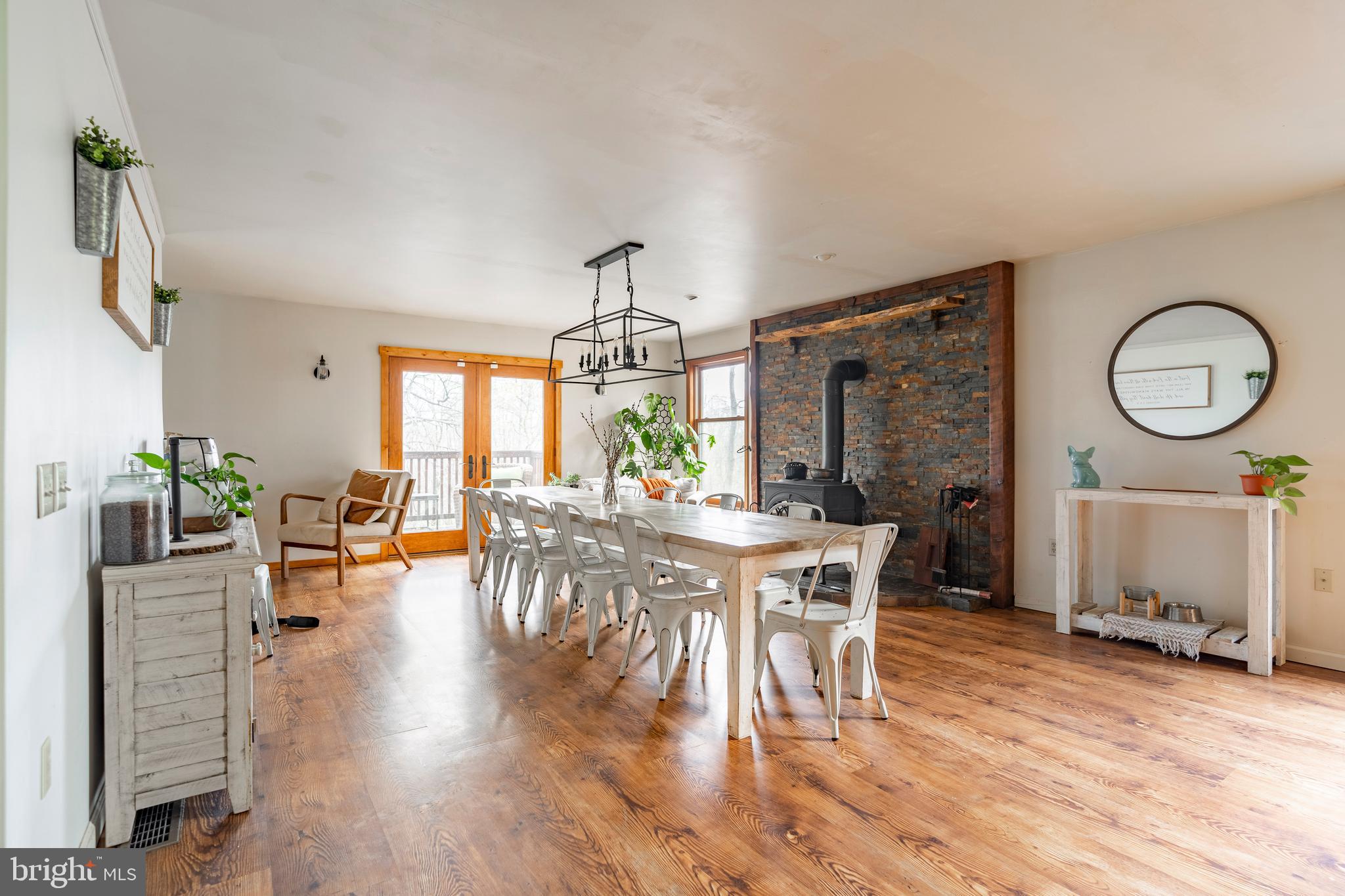 755 Sportsman Road Denver, PA 17517 - Photo 35 of 77 a view of a dining room with furniture window and wooden floor