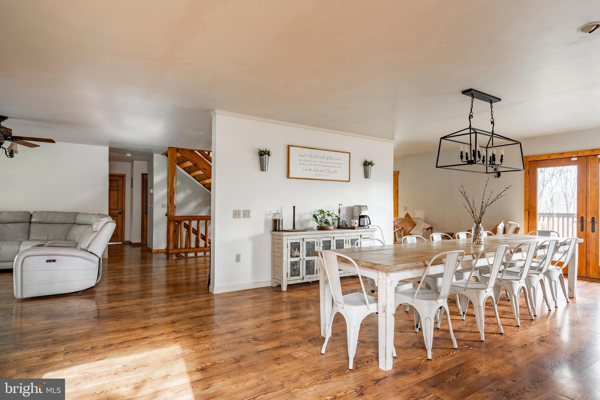 755 Sportsman Road Denver, PA 17517 - Photo 38 of 77 a view of a dining room with furniture window and wooden floor