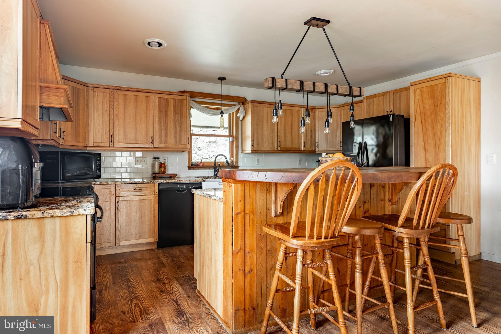 755 Sportsman Road Denver, PA 17517 - Photo 39 of 77 a kitchen with stainless steel appliances a stove a refrigerator and a microwave