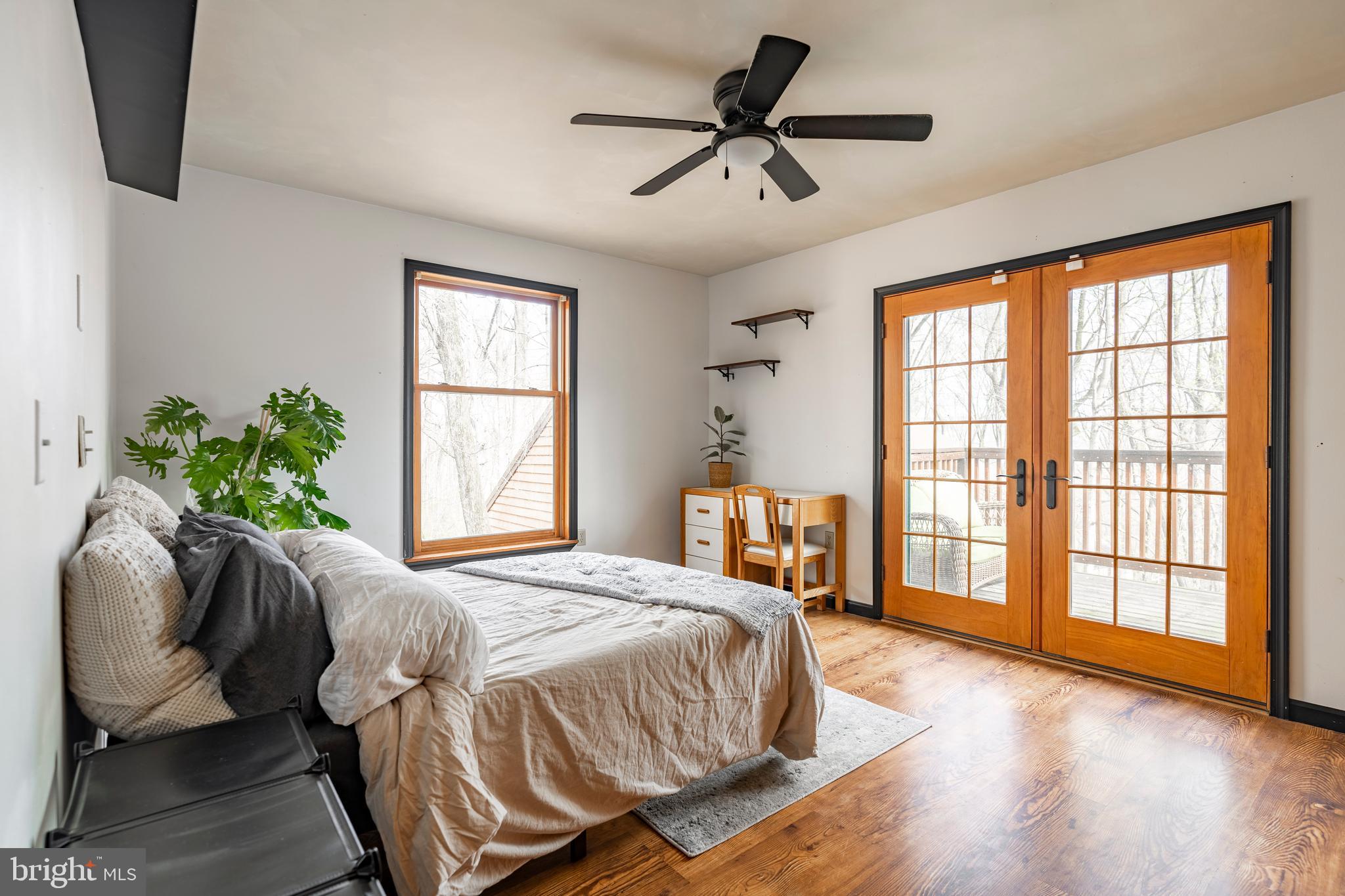 755 Sportsman Road Denver, PA 17517 - Photo 46 of 77 a bedroom with a bed and a large window