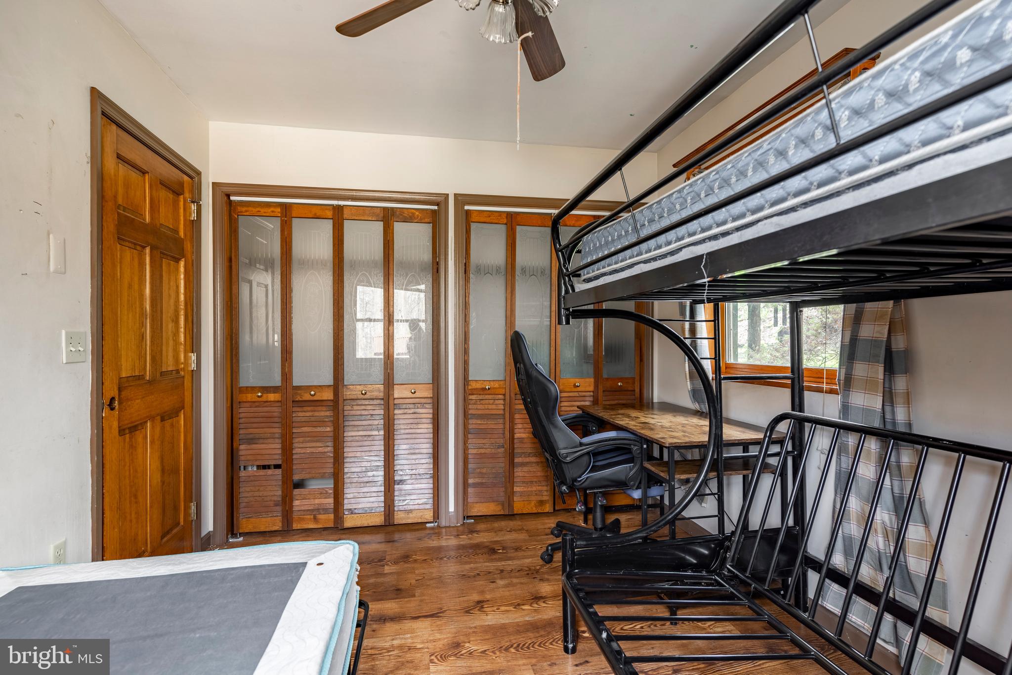 755 Sportsman Road Denver, PA 17517 - Photo 50 of 77 a view of a porch with furniture and floor to ceiling window