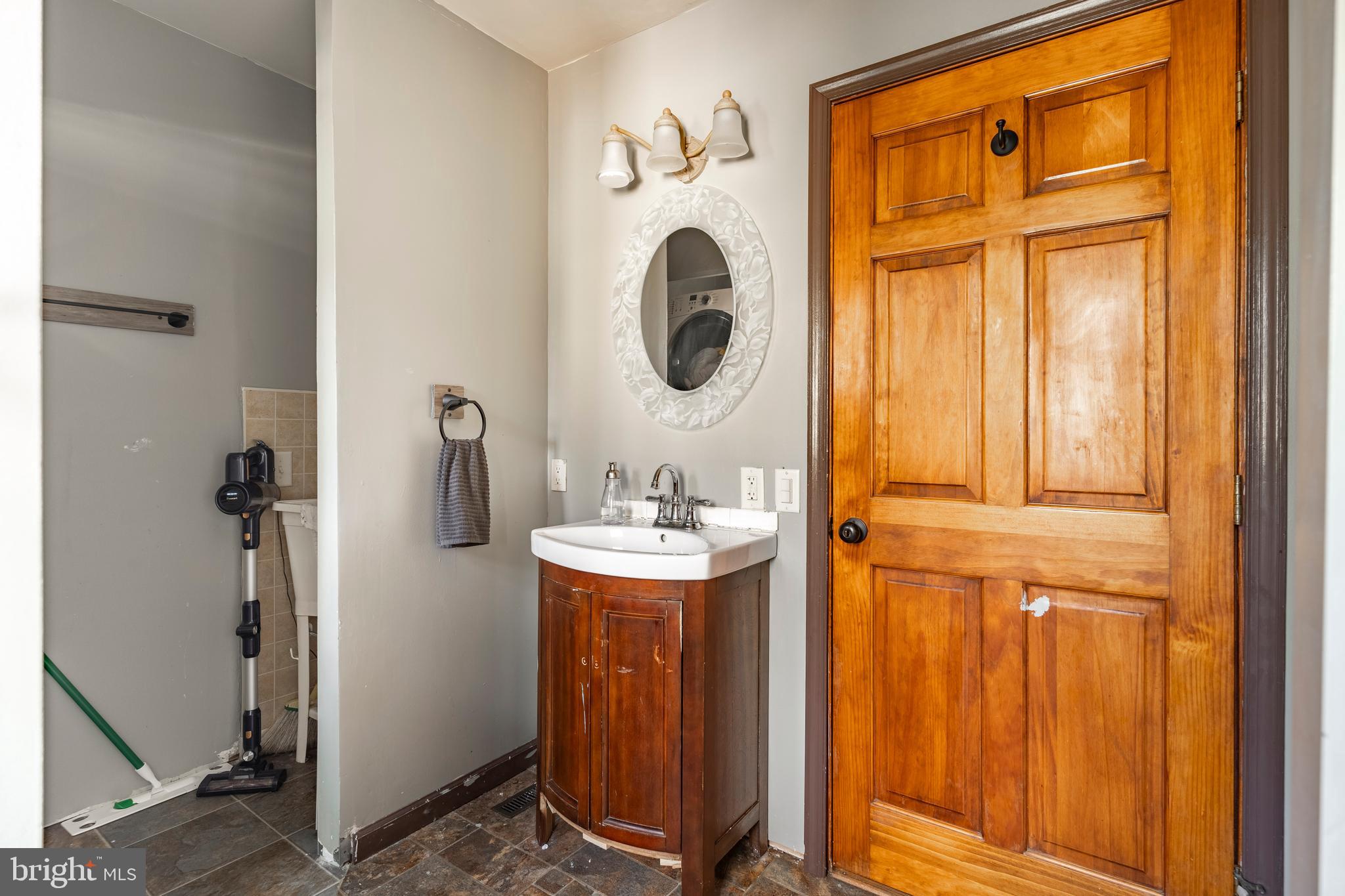755 Sportsman Road Denver, PA 17517 - Photo 52 of 77 a bathroom with a sink and a mirror