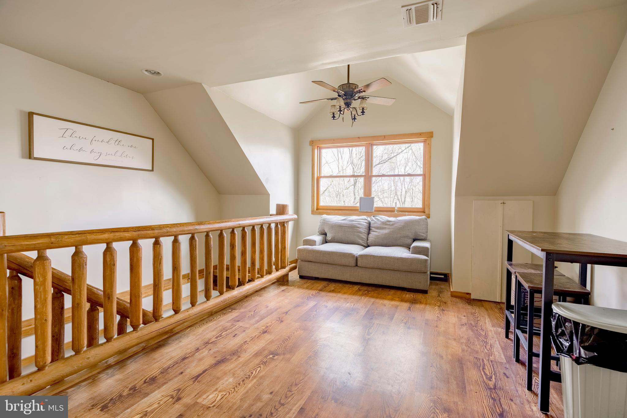 755 Sportsman Road Denver, PA 17517 - Photo 55 of 77 a living room with furniture and a wooden floor