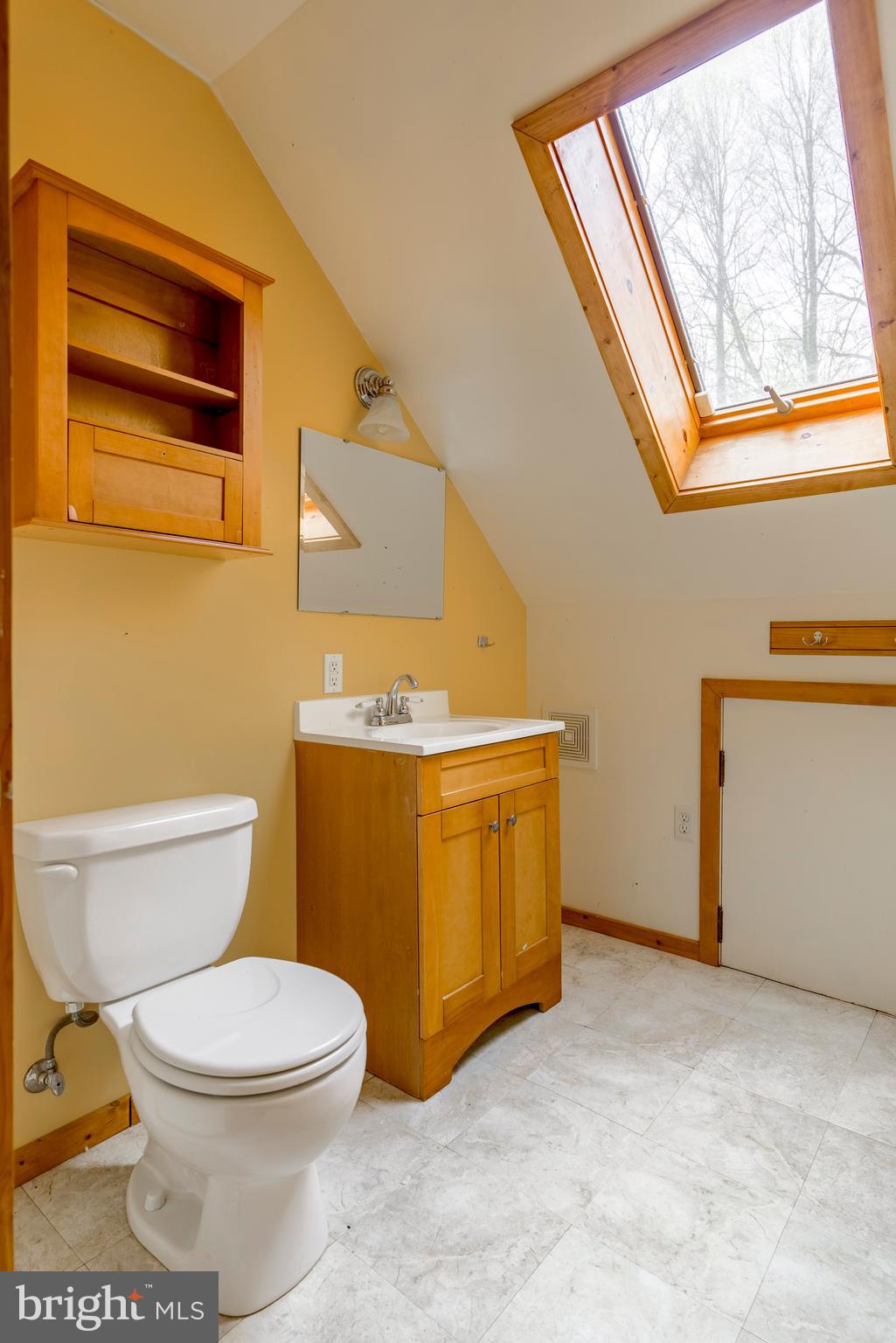 755 Sportsman Road Denver, PA 17517 - Photo 62 of 77 a bathroom with a toilet a sink and a window