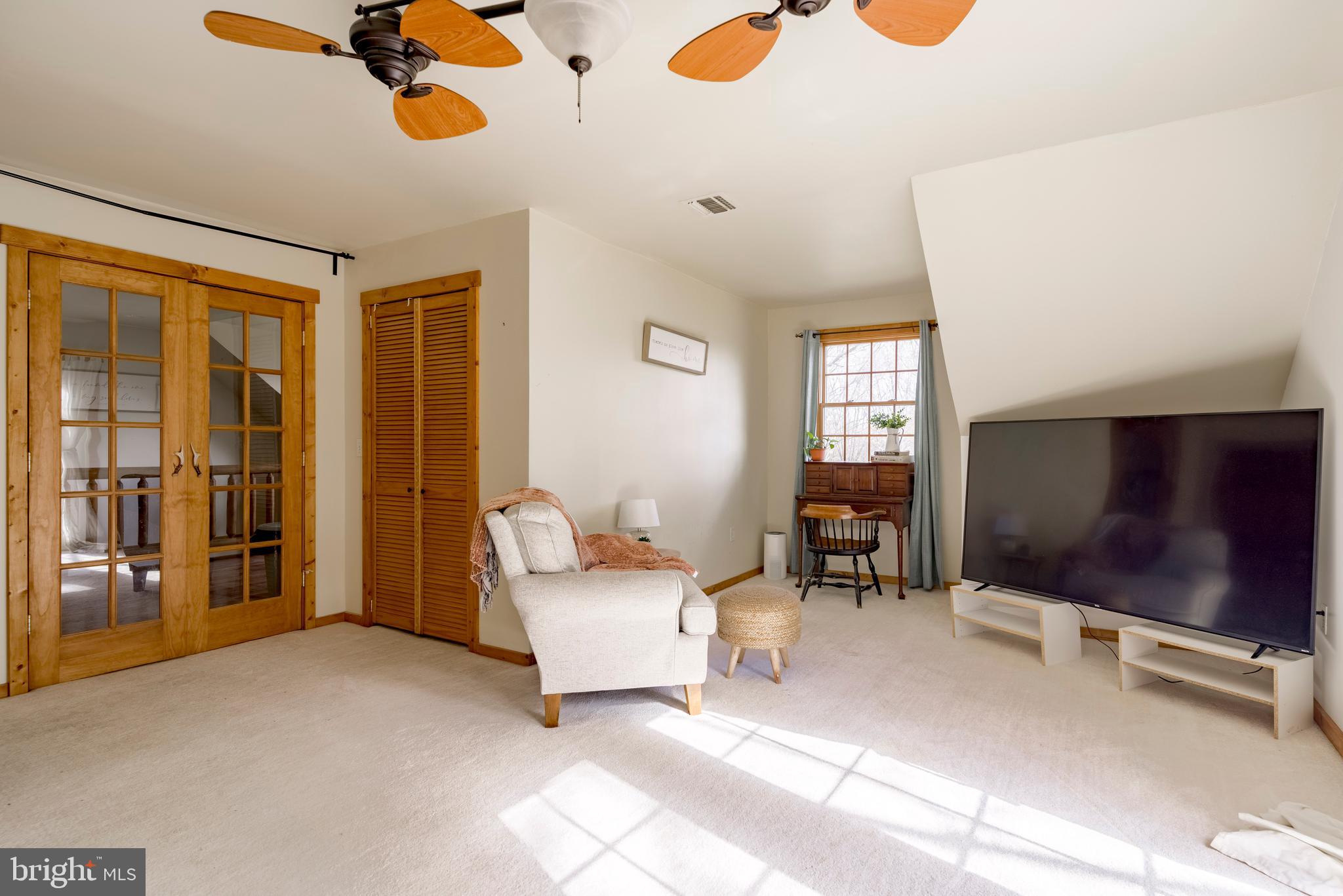 755 Sportsman Road Denver, PA 17517 - Photo 67 of 77 a living room with furniture and a flat screen tv