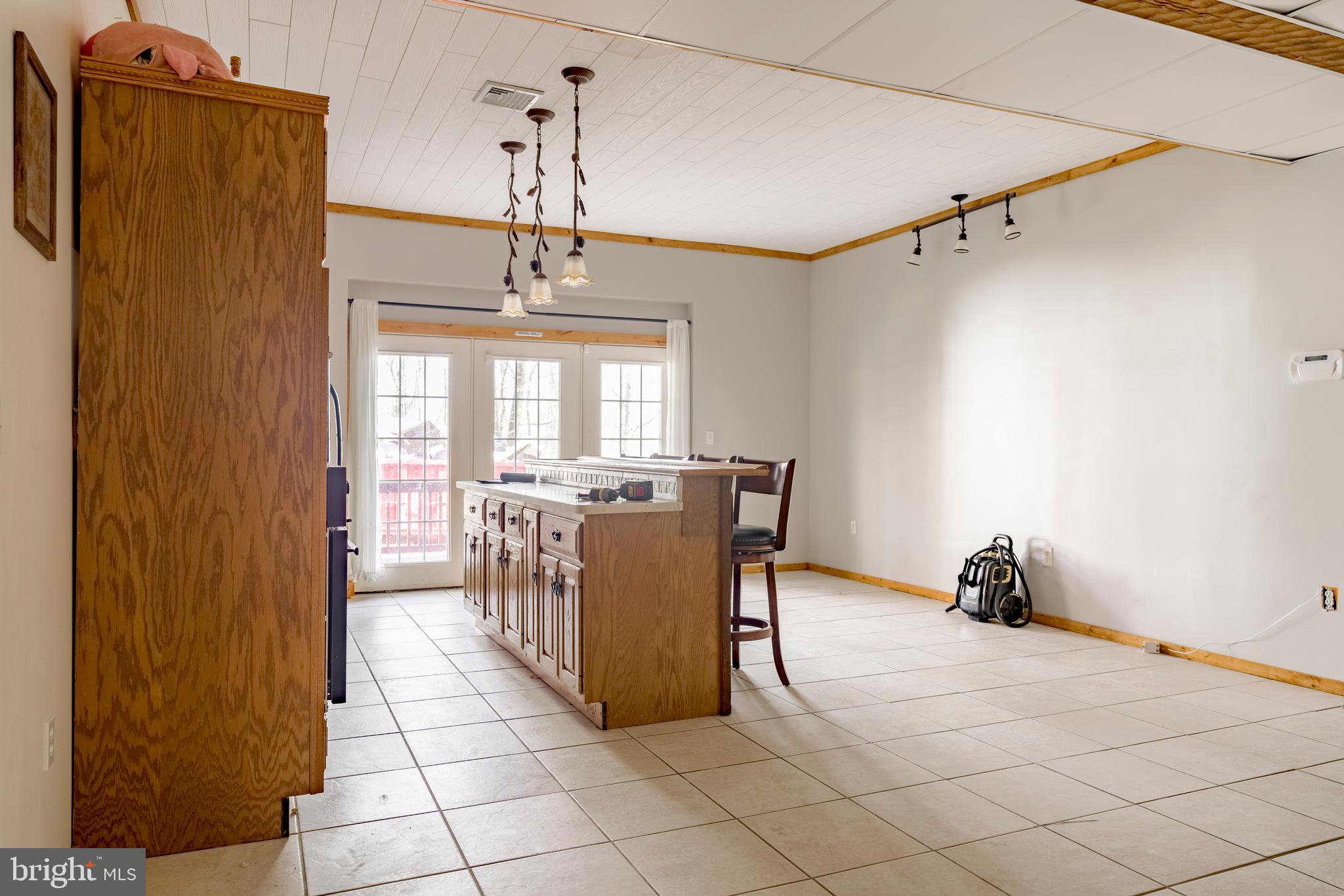 755 Sportsman Road Denver, PA 17517 - Photo 75 of 77 a dining room with furniture and a window