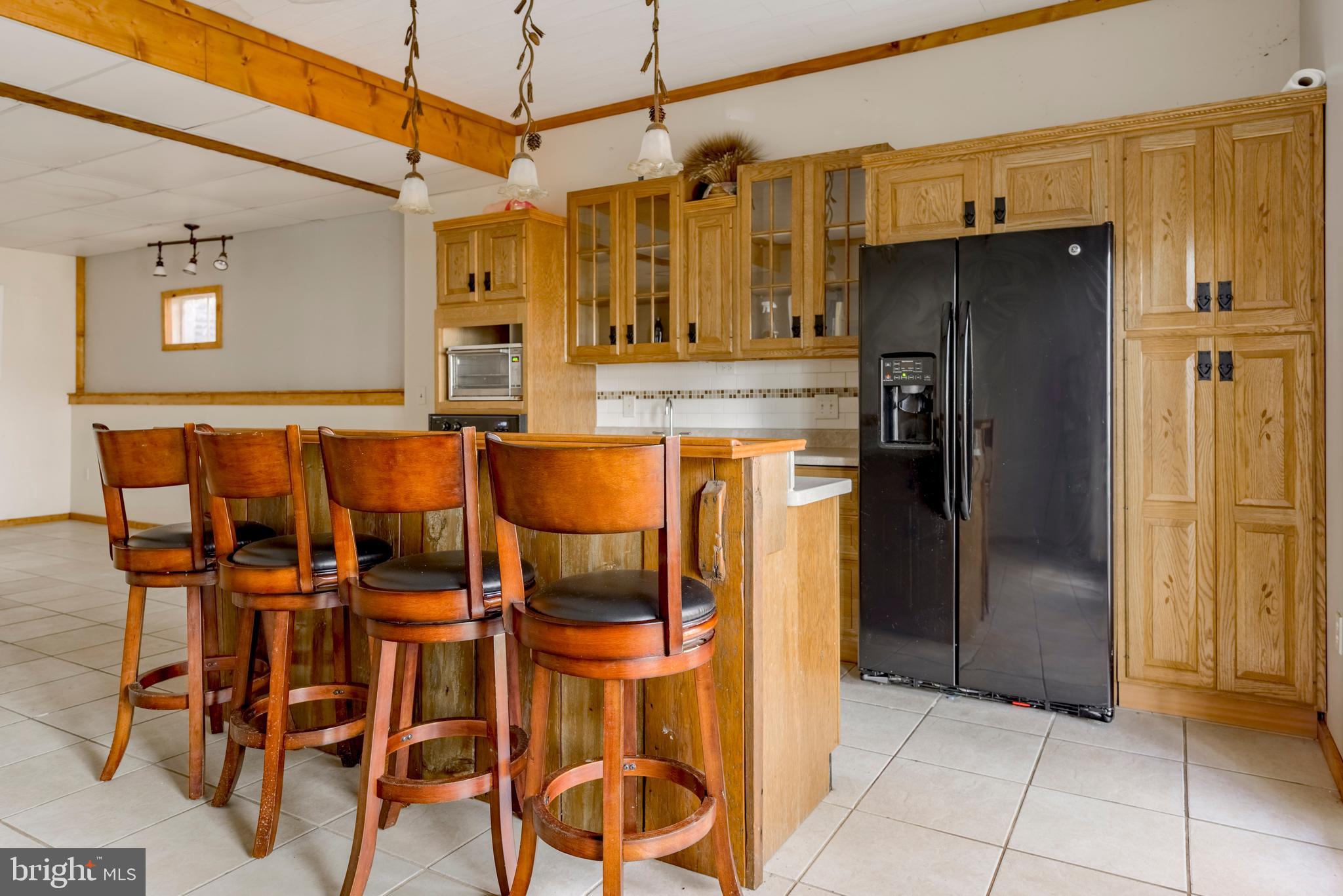 755 Sportsman Road Denver, PA 17517 - Photo 77 of 77 a kitchen with stainless steel appliances a refrigerator and microwave