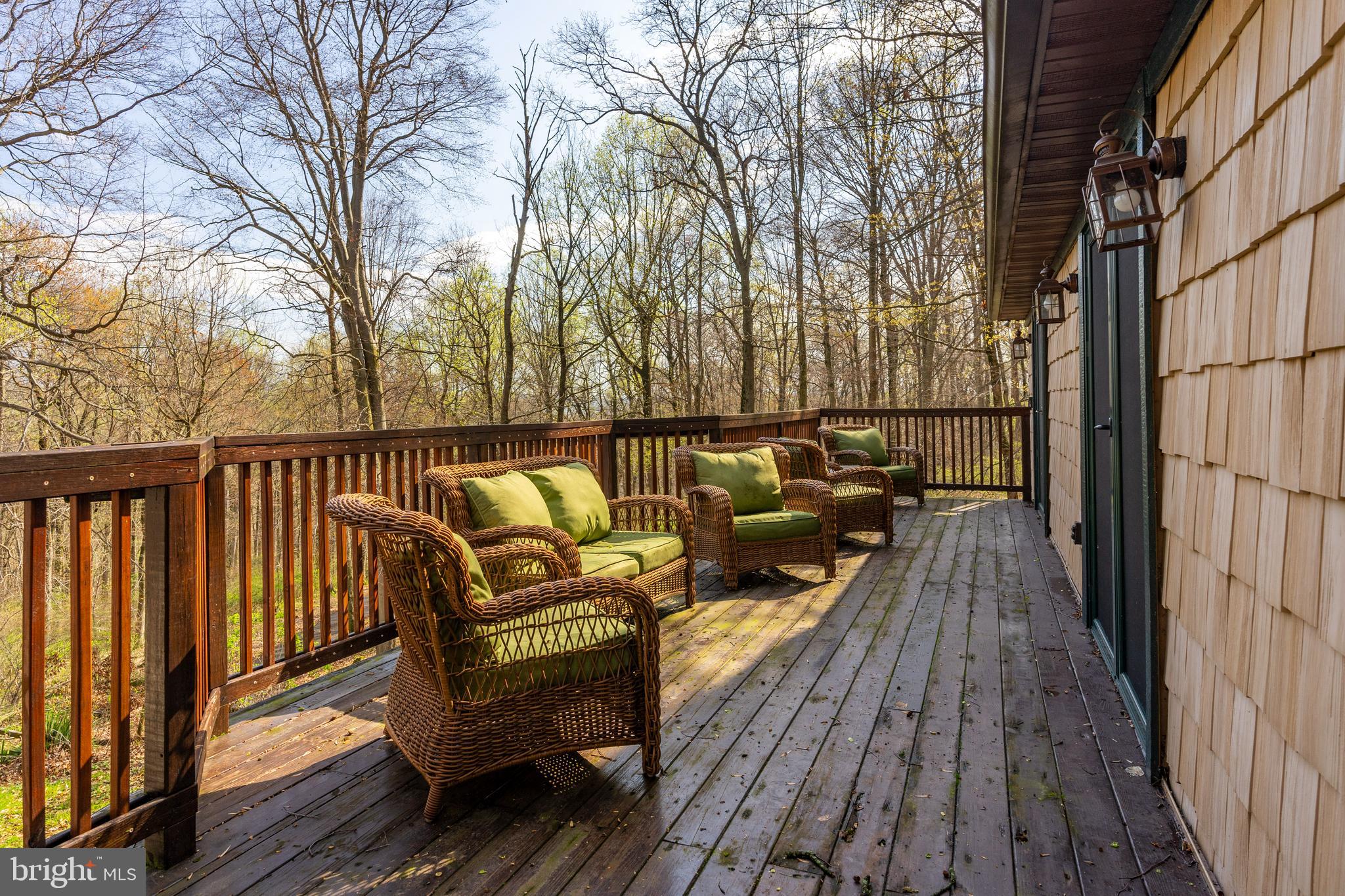 755 Sportsman Road Denver, PA 17517 - Photo 8 of 77 a view of a roof deck with wooden floor and fence