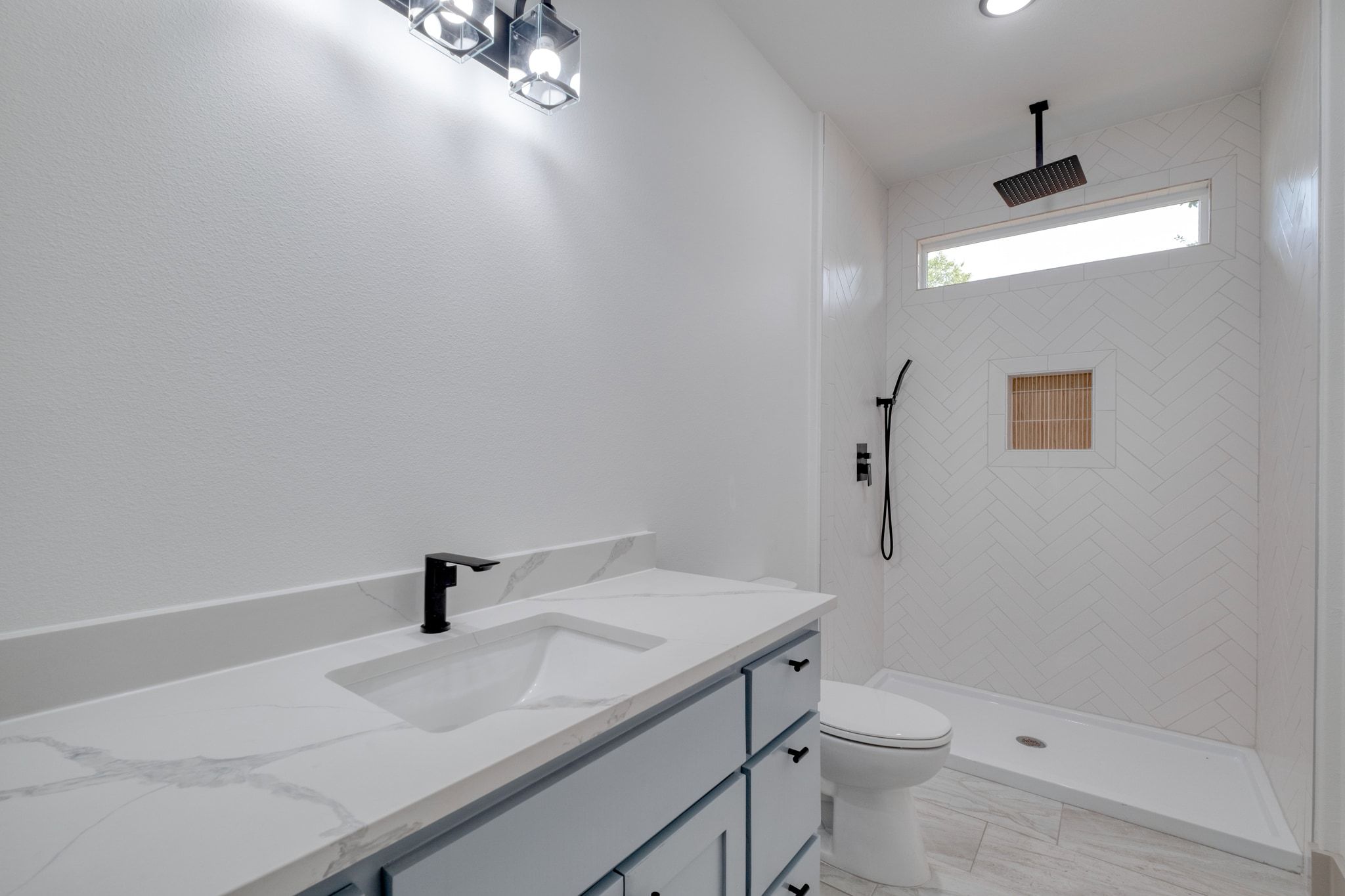 202 Washington Street Elgin, TX 78621 - Photo 21 of 26 Bathroom with vanity and a stall shower