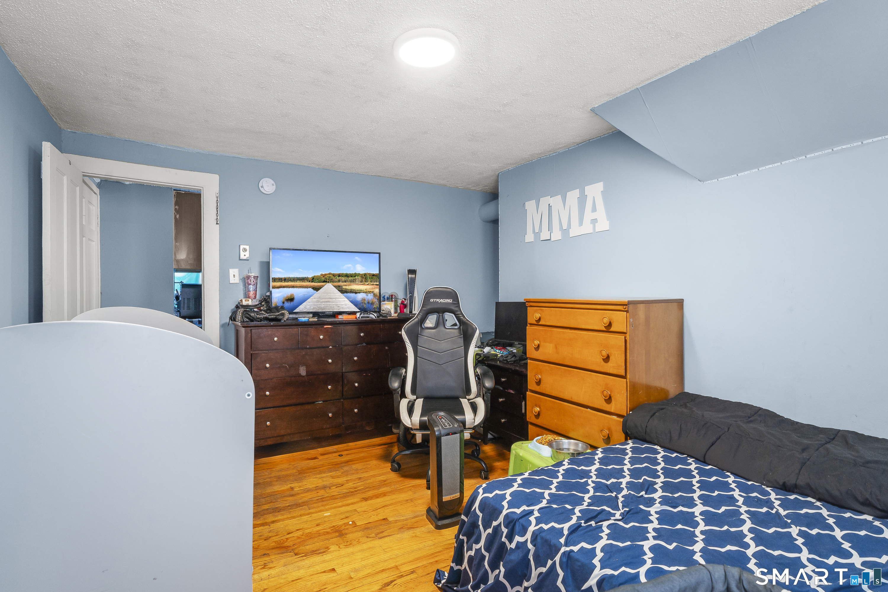 160 Springdale Avenue Meriden, CT 06451 - Photo 16 of 19 a bedroom with double bed and a lamp on dresser