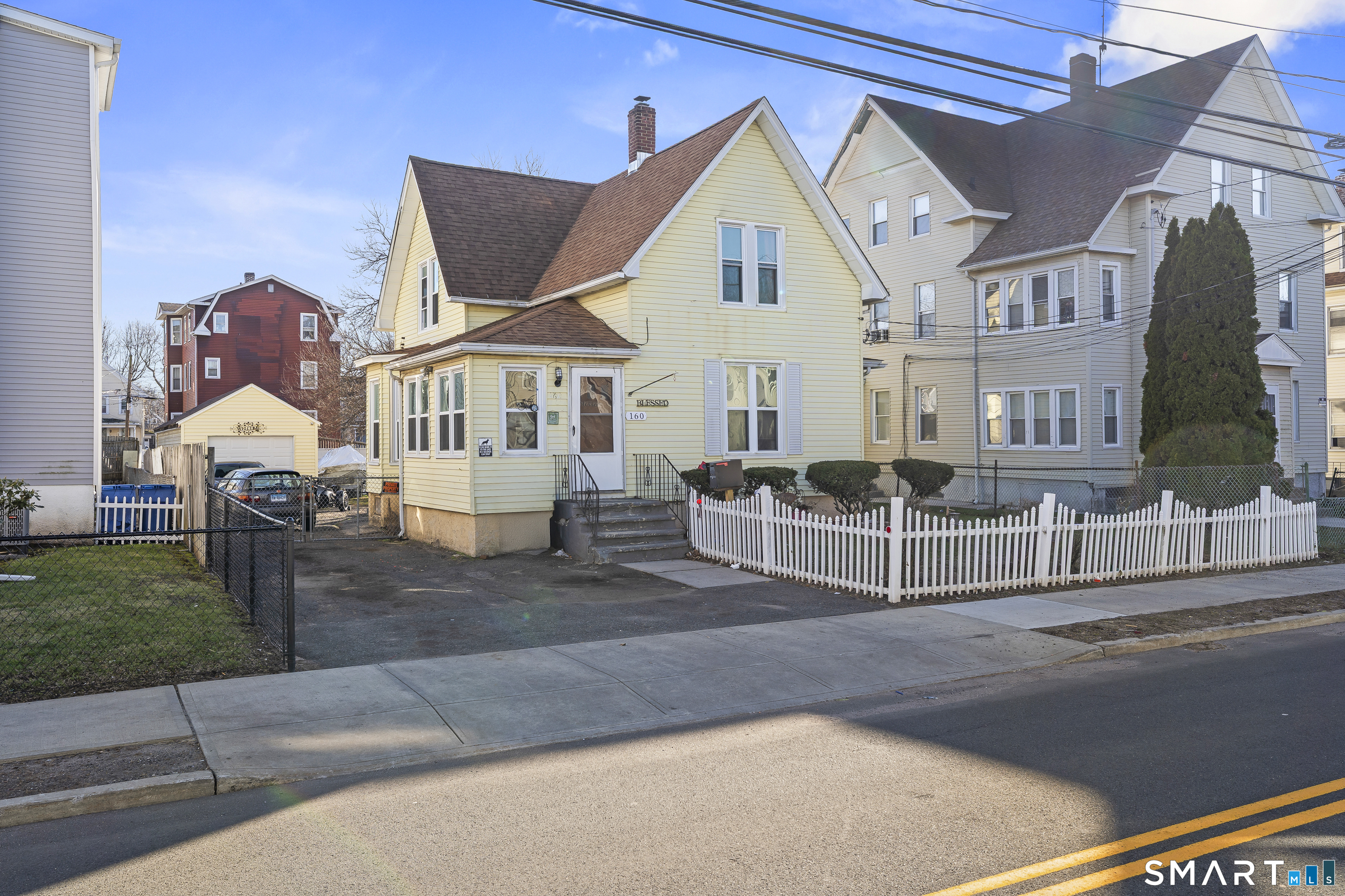 160 Springdale Avenue Meriden, CT 06451 - Photo 2 of 19 a front view of a house with porch