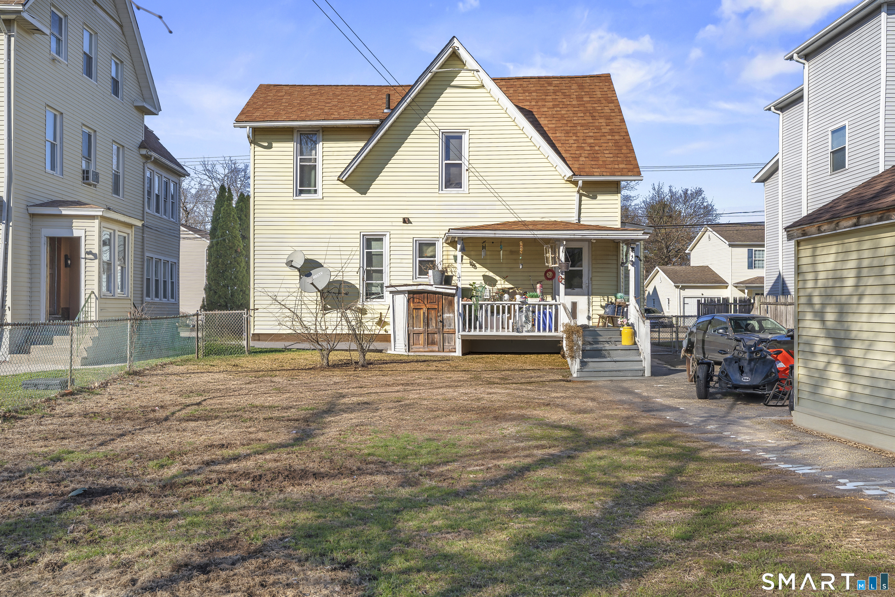 160 Springdale Avenue Meriden, CT 06451 - Photo 3 of 19 a view of a white house with swimming pool and sitting area