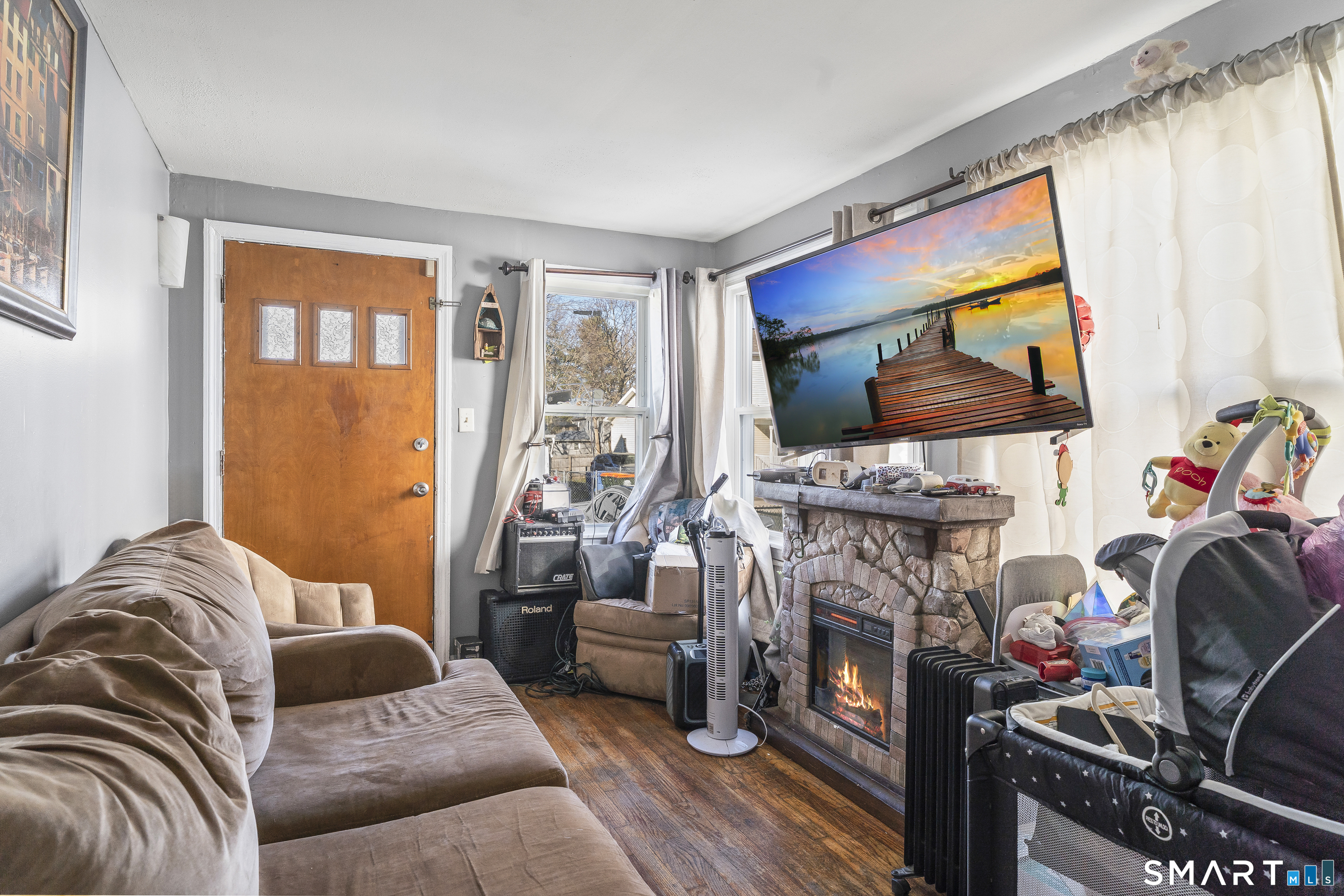 160 Springdale Avenue Meriden, CT 06451 - Photo 7 of 19 a living room with furniture and a flat screen tv