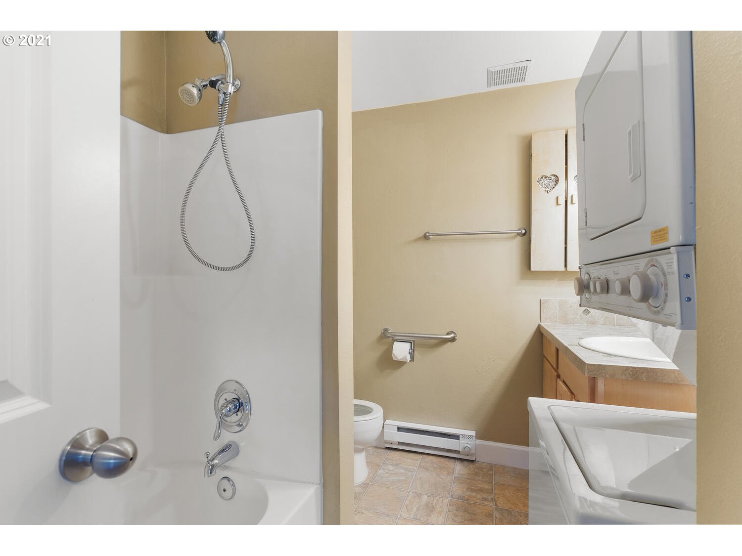 8065 North Ivanhoe Street, Unit 5 Portland, OR 97203 - Photo 18 of 32 a bathroom with a sink and a mirror