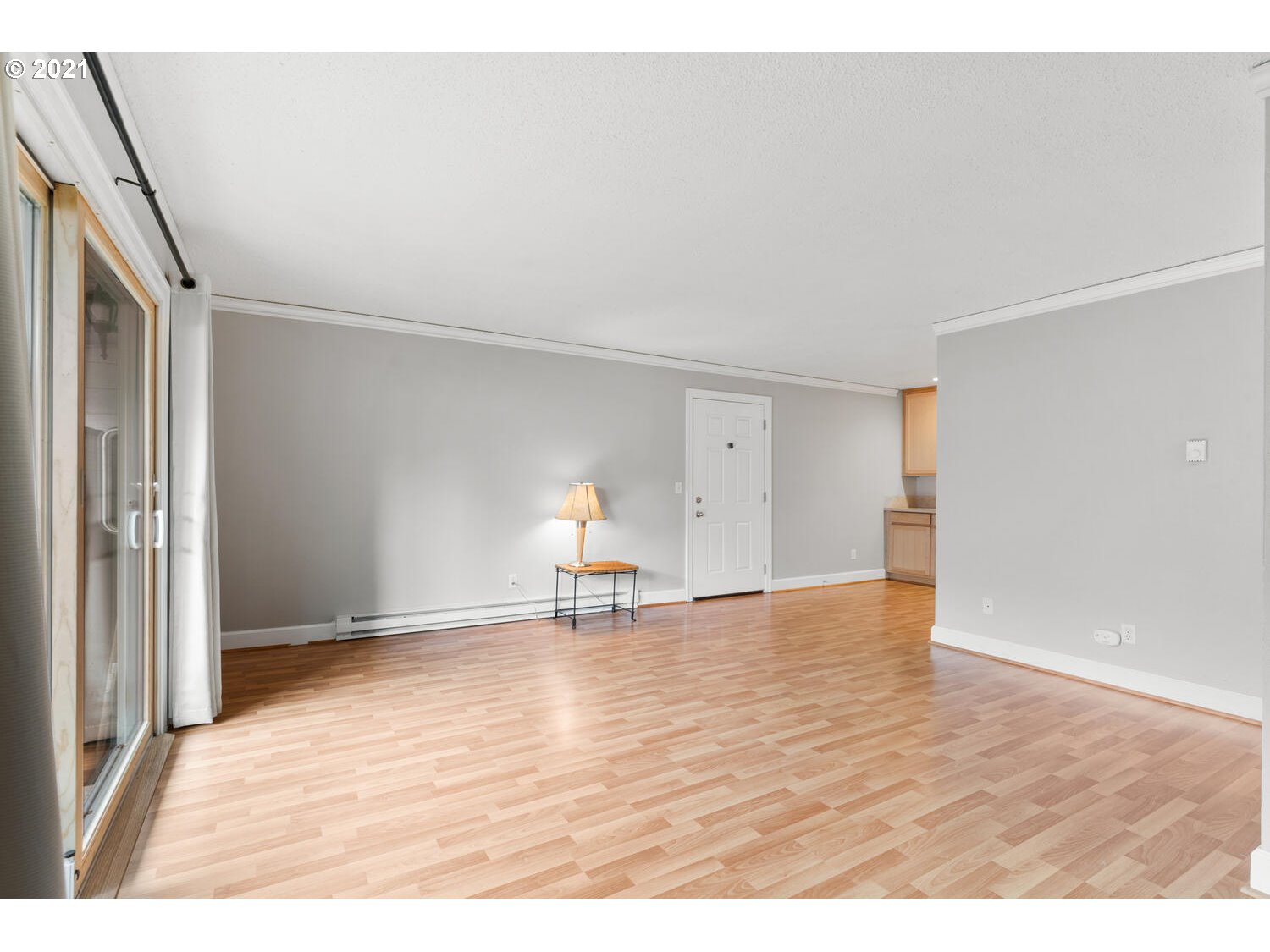 8065 North Ivanhoe Street, Unit 5 Portland, OR 97203 - Photo 9 of 32 a view of empty room with wooden floor