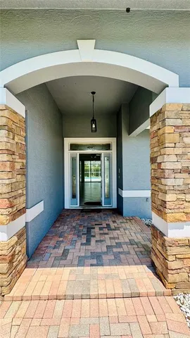 a view of entryway with a front door