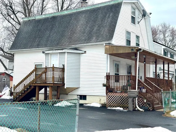 a view of road with large trees