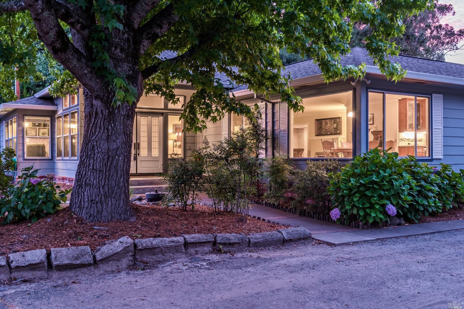 8282 Mill Station Road Sebastopol, CA 95472 - Photo 1 of 1 a front view of a house with garden