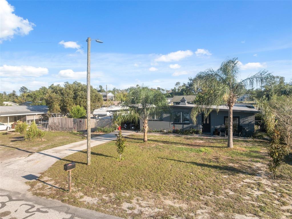 7002 Eisenhower Street Weeki Wachee, FL 34613 - Photo 27 of 65 a view of a swimming pool with a patio