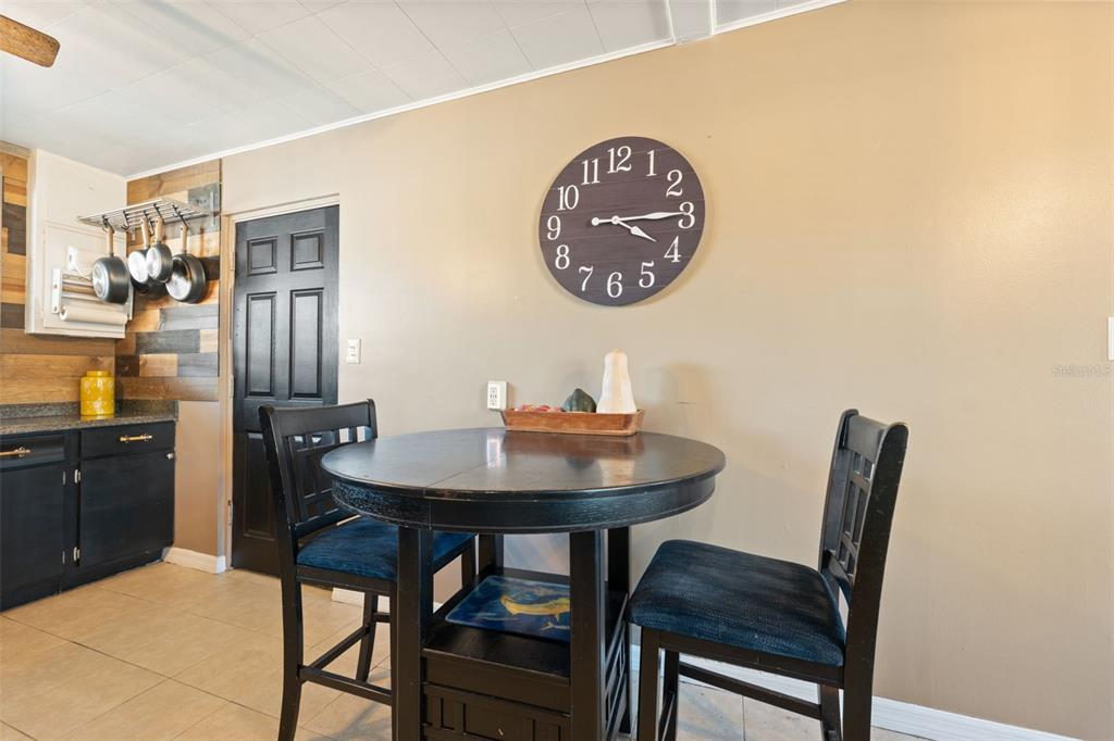 7002 Eisenhower Street Weeki Wachee, FL 34613 - Photo 4 of 65 a view of a dining room with furniture