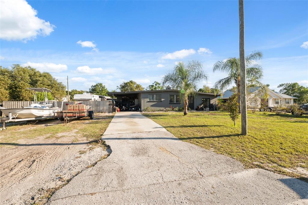 7002 Eisenhower Street Weeki Wachee, FL 34613 - Photo 50 of 65 a view of yard with swimming pool