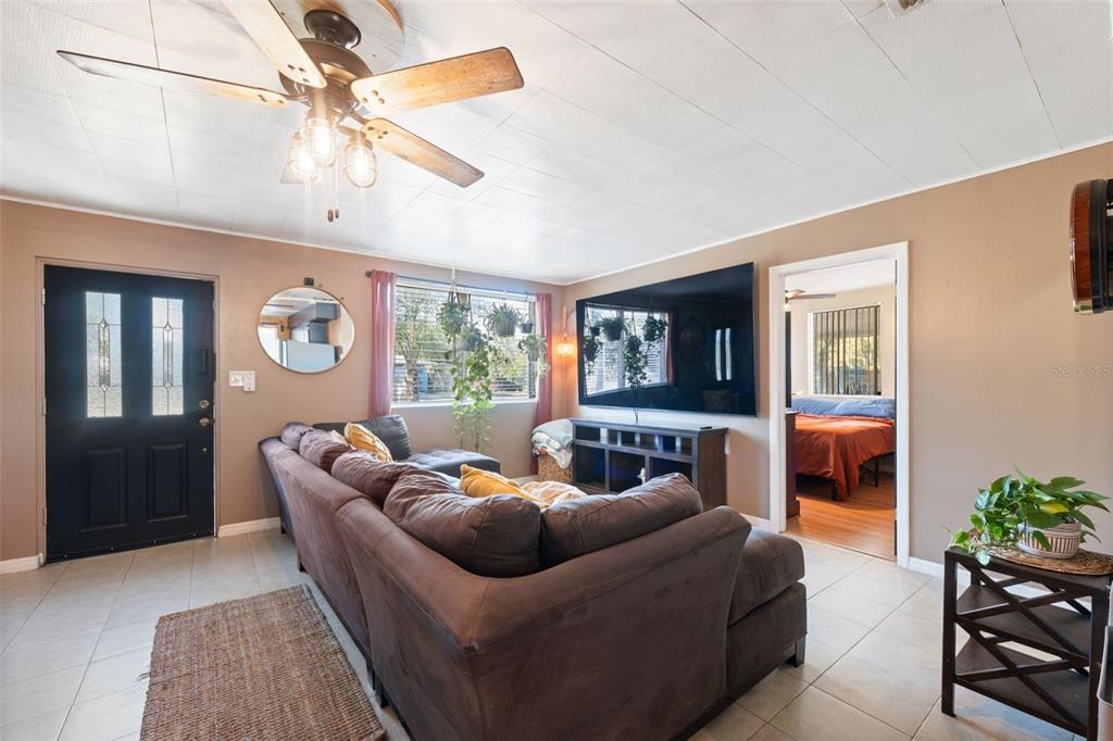 7002 Eisenhower Street Weeki Wachee, FL 34613 - Photo 56 of 65 a living room with furniture and a window