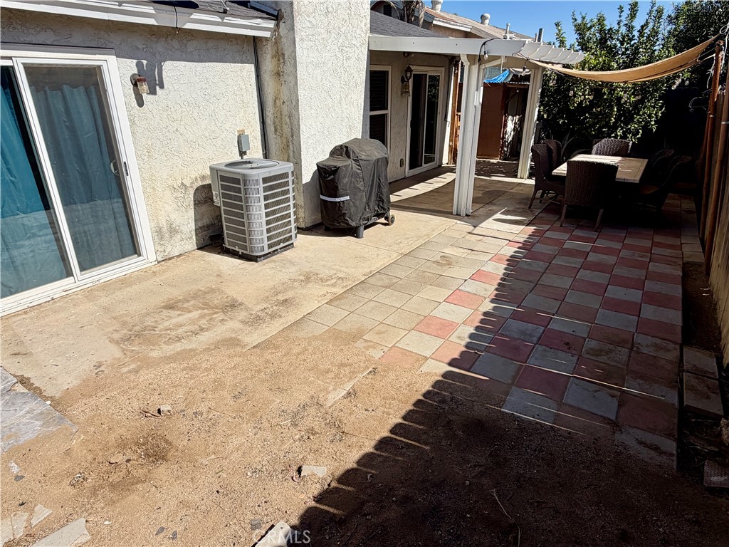 321 Red Cedar Place Perris, CA 92570 - Photo 11 of 21 a view of a porch with furniture
