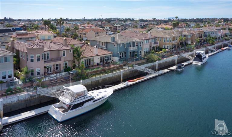 an aerial view of residential house with outdoor space and river