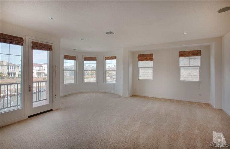 4057 West Hemlock Street Oxnard, CA 93035 - Photo 9 of 11 a view of an empty room with windows